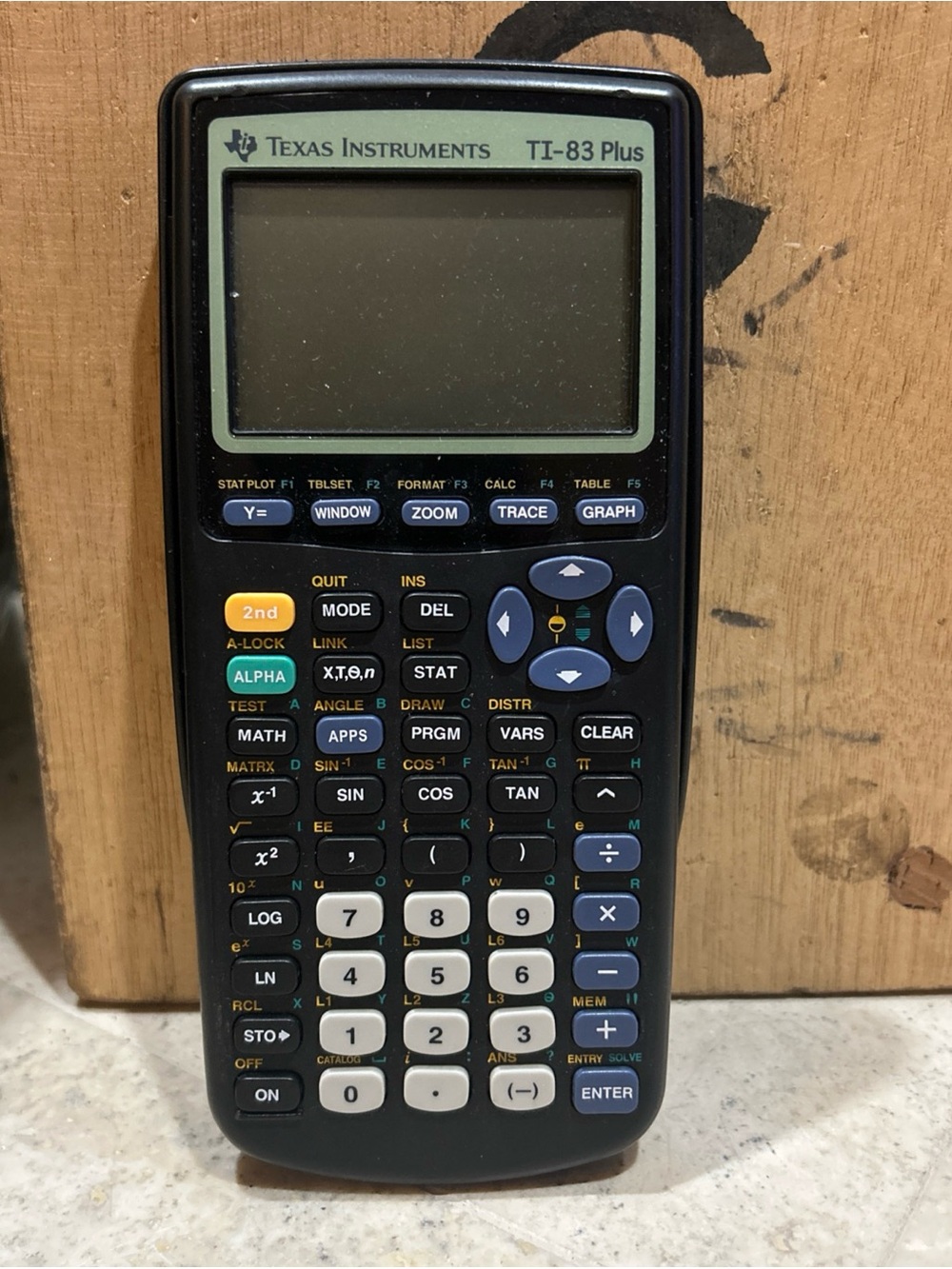 Texas Instruments TI-83 Handheld Graphing Calculator